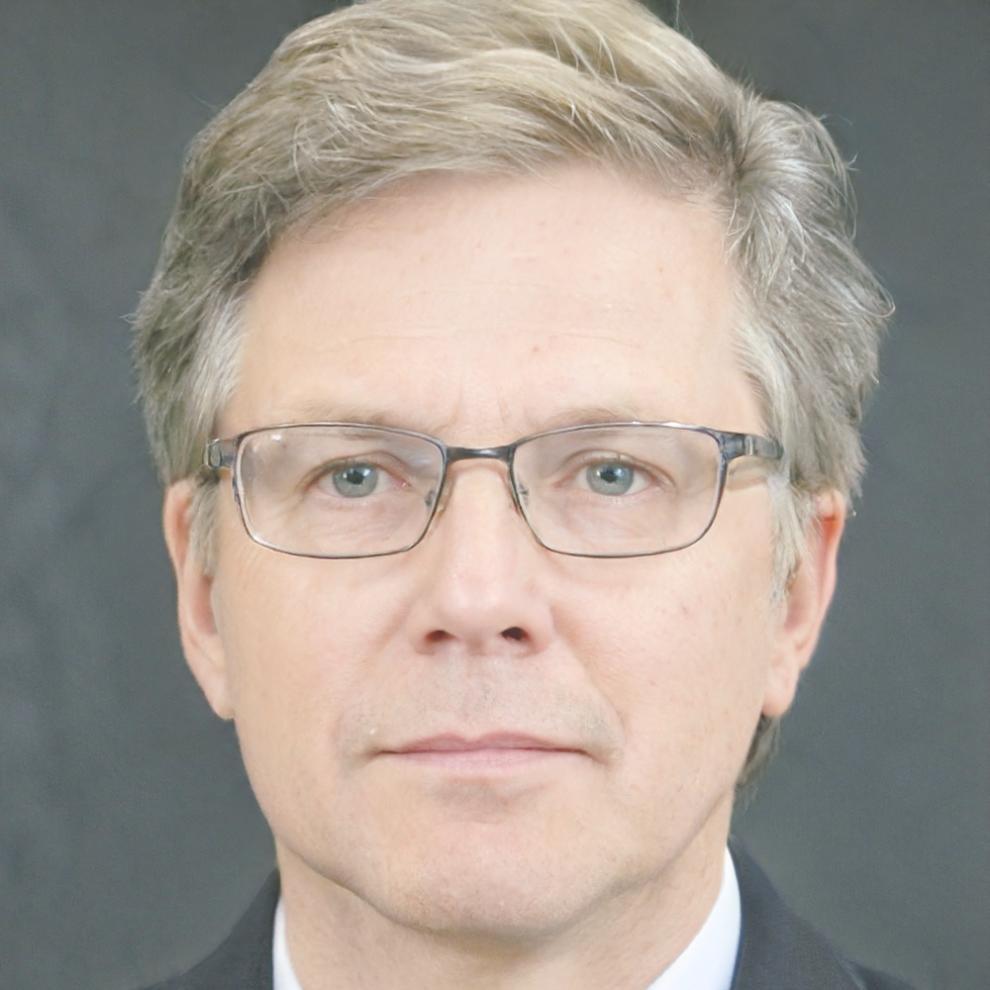 Instructor Callum Stonebridge reviewing payment system code with program participants